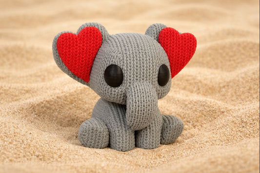 Elefant mit Herzohren im Strickstil